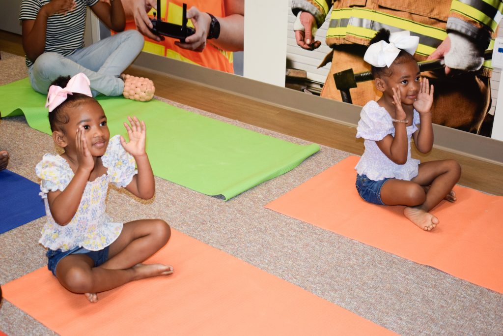 Little girls doing yoga