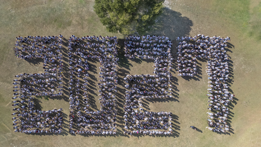 Incoming freshmen spell out 2027 in the grass