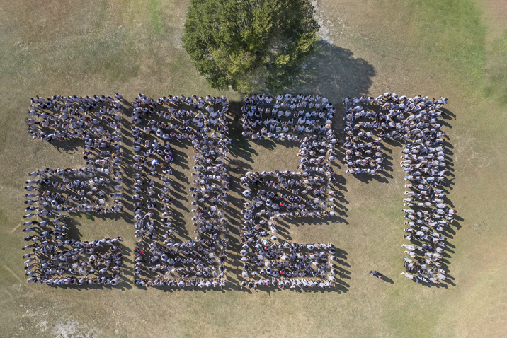 Incoming freshmen spell out 2027 in the grass