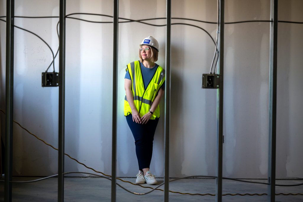 Woman standing in construction site