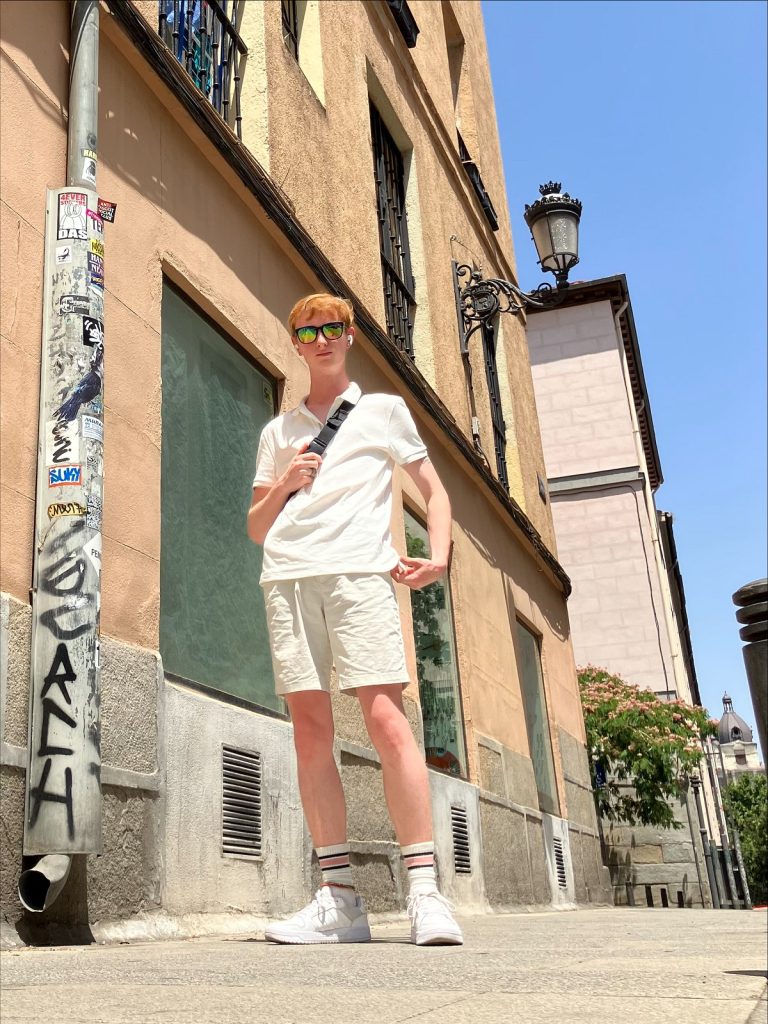 Young student standing in front of a building in Spain