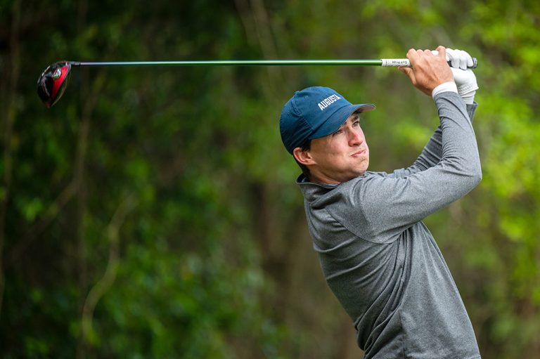 Man playing golf