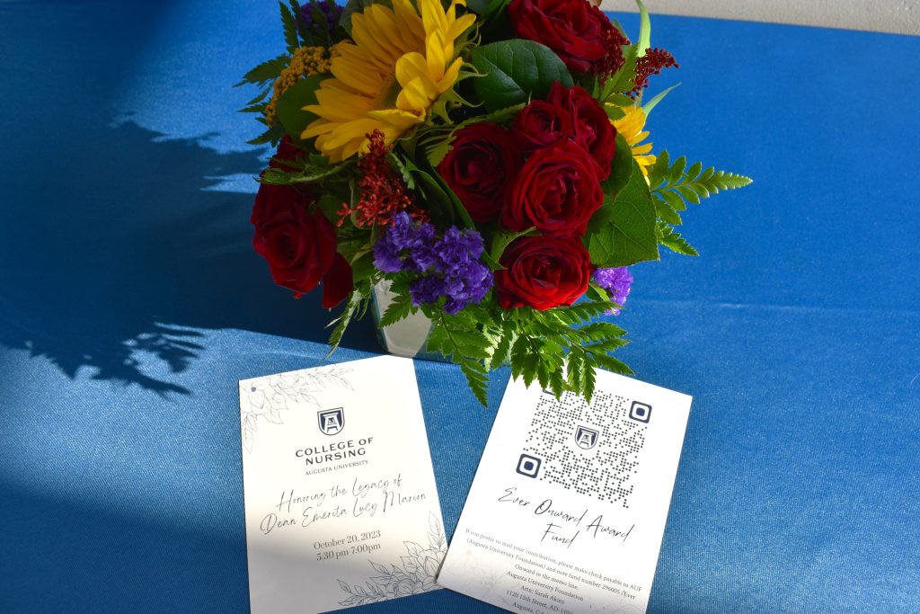 Autumn flowers with program and donation card.