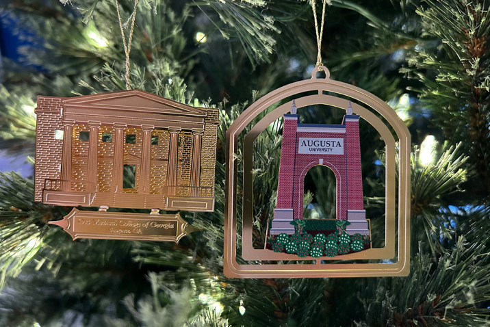 ornaments of the old Medical College of Georgia building and the Augusta University arch
