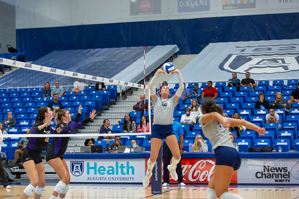 Women playing volleyball