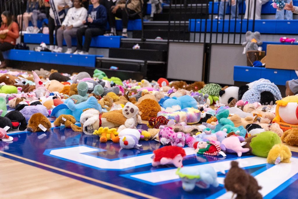 stuffed animals on a basketball court