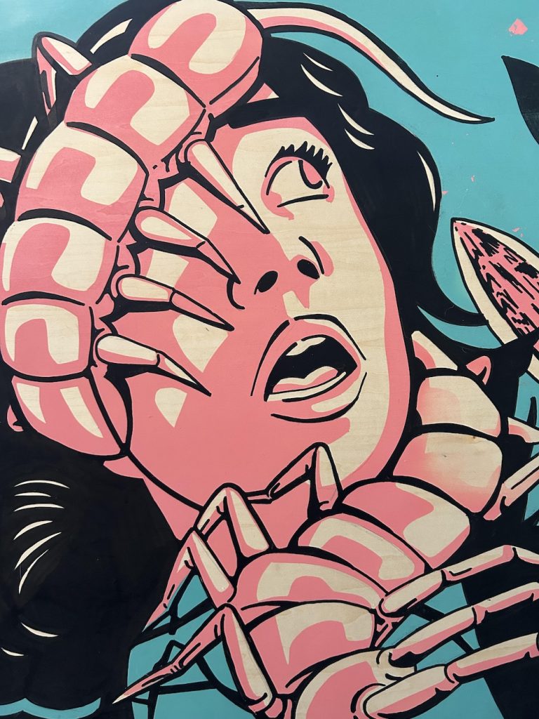 Artwork depicting centipedes crawling over a woman.