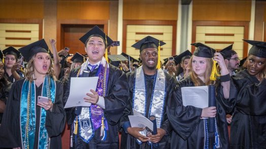 students celebrate graduation