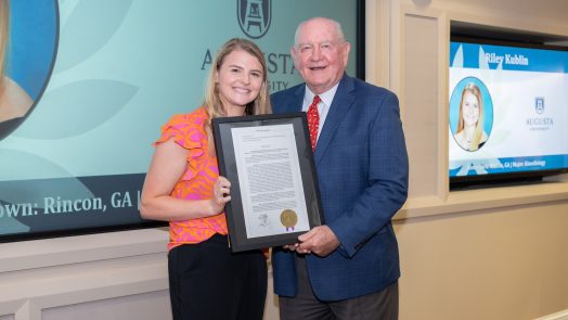 Woman accepting an award