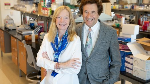 Man and woman standing in scientific lab