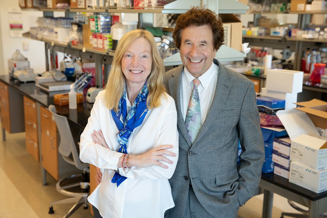 Man and woman standing in scientific lab