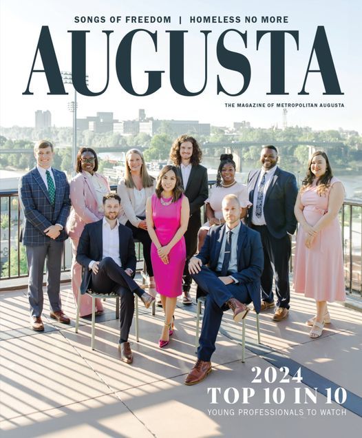 Cover of Augusta Magazine, with a group photo of 10 men and women in business attire outside.