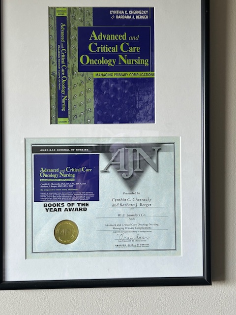 A framed award for a book.