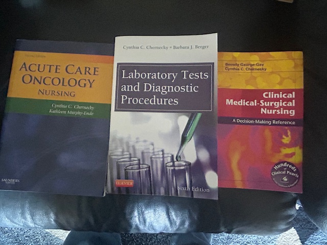 Three books -- one on acute care oncology nursing, another on laboratory tests and diagnostic procedures, and the third on clinical medical-surgical nursing -- are pictured side by side.