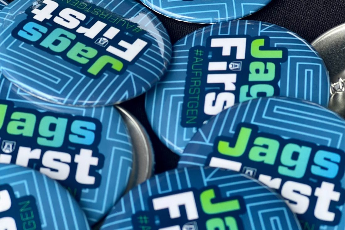 Blue push pin buttons that read "Jags First."