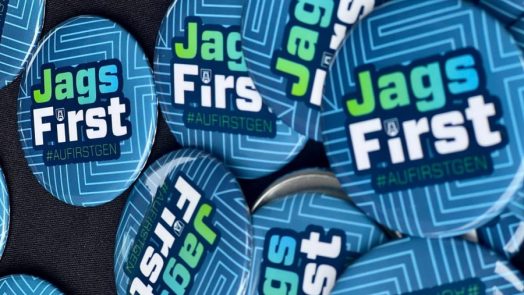 Blue push pin buttons that read "Jags First."