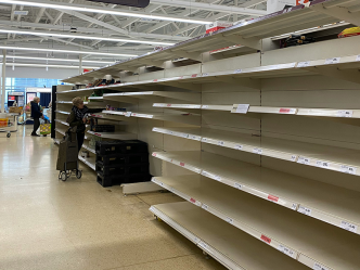 Empty grocery store shelves.