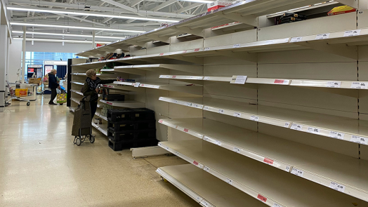 Empty grocery store shelves.