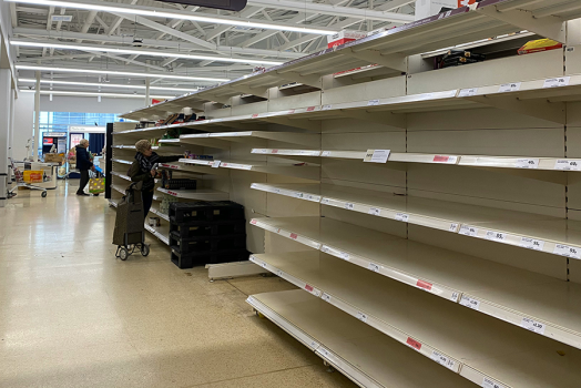 Empty grocery store shelves.