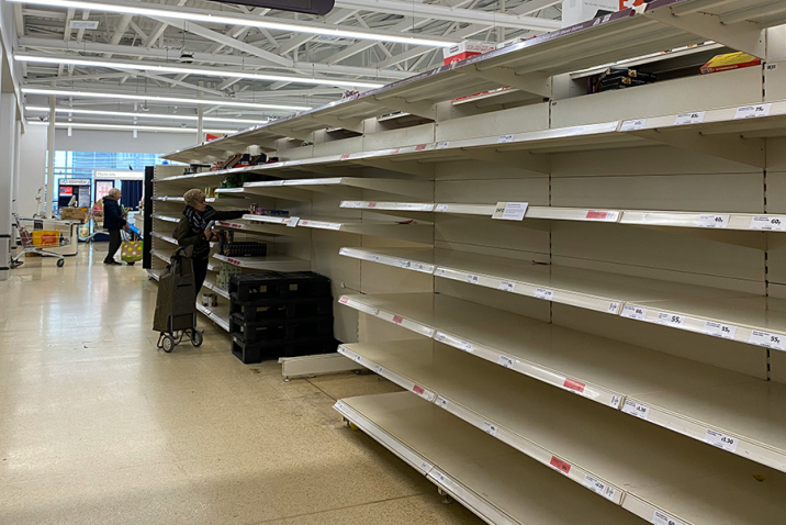 Empty grocery store shelves.