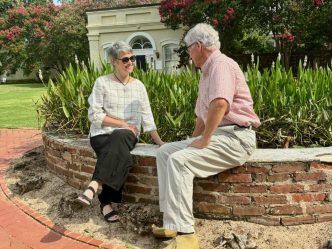 Couple seated in garden