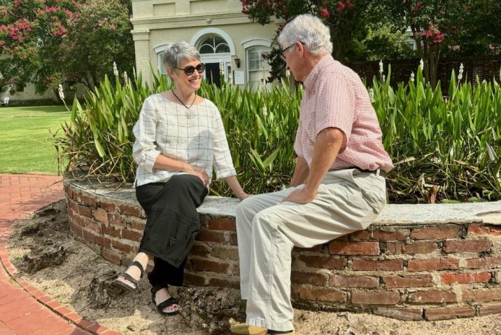 Couple seated in garden