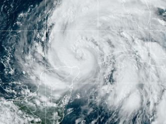 A weather photo of a hurricane swirling in the Gulf of Mexico [Credit: NOAA]