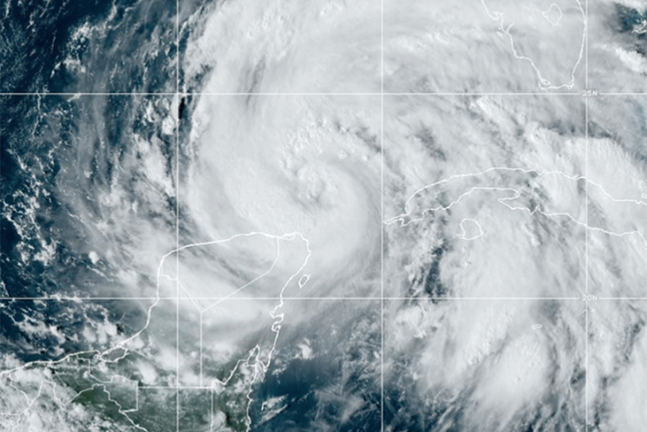 A weather photo of a hurricane swirling in the Gulf of Mexico [Credit: NOAA]