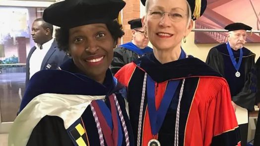 Two women smiling