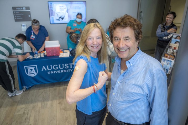 Two people at flu shot clinic