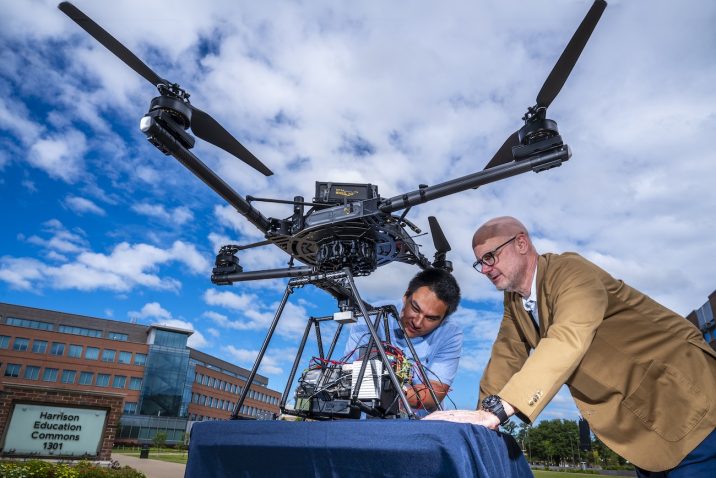 Two people with the drone