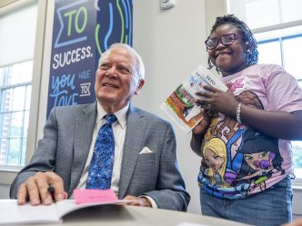 Former Gov. Nathan Deal signing his book.