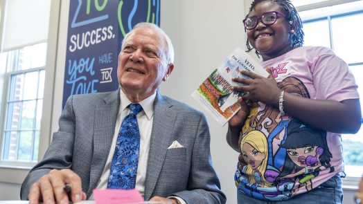 Former Gov. Nathan Deal signing his book.