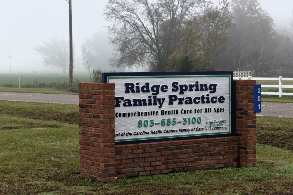 A sign outside by a road for Ridge Spring Family Practice.