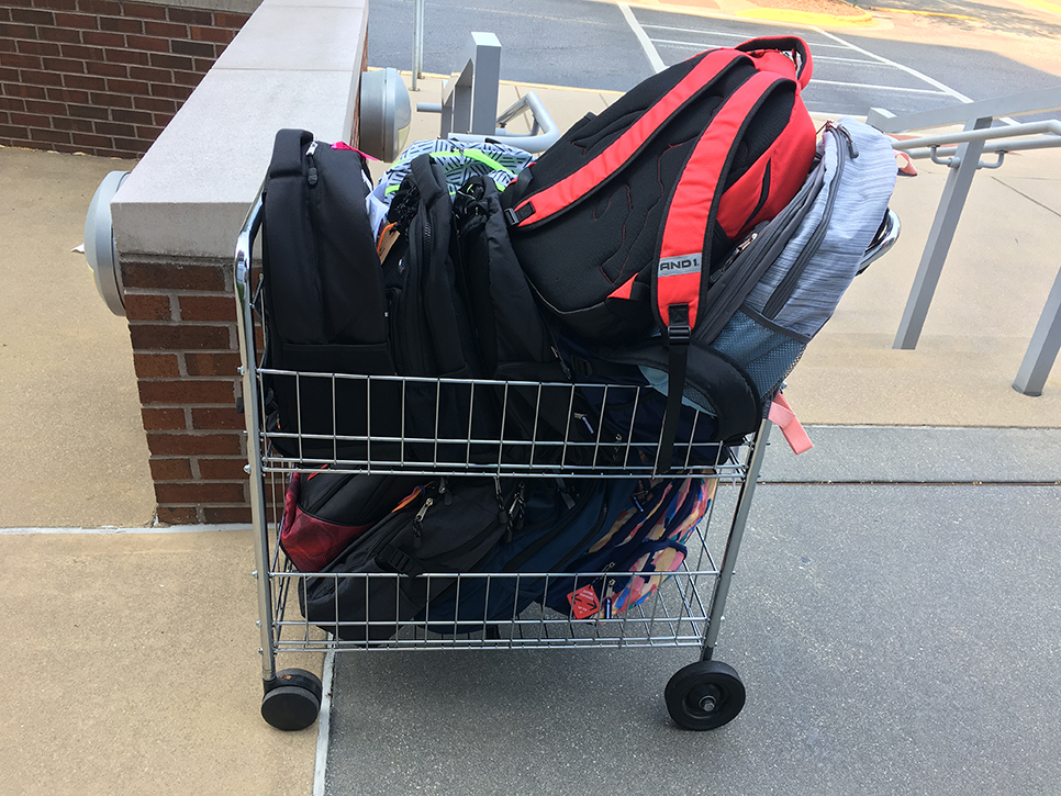 Backpacks in a cart