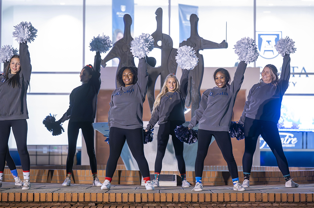 Cheerleaders performing a routine