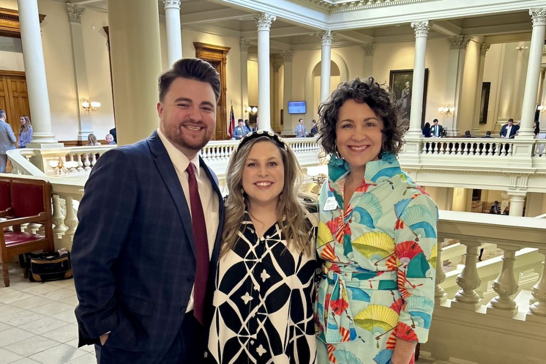 Three people in the Gold Dome in Atlanta