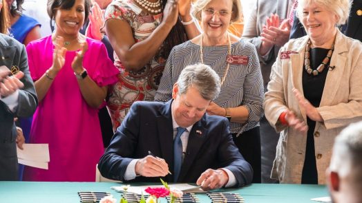 Governor signing the bill