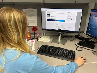An Augusta University student accesses Student Health Services new online scheduling platform.