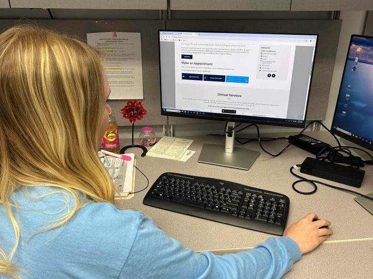 An Augusta University student accesses Student Health Services new online scheduling platform.