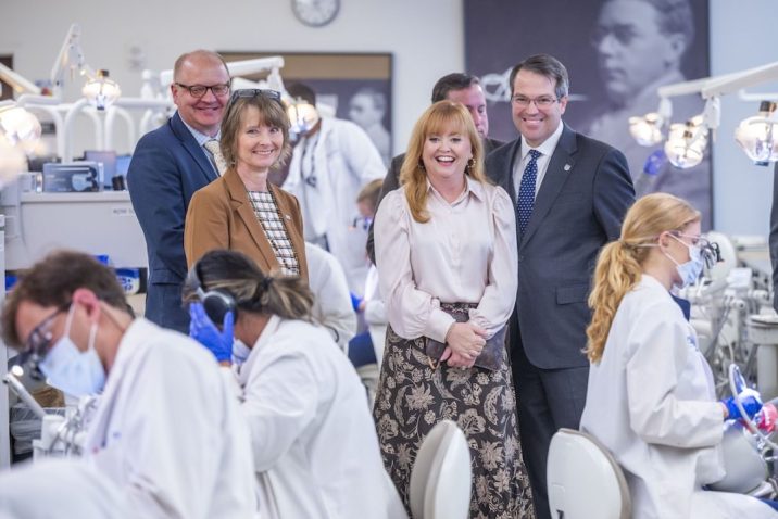 Augusta University president touring the Dental College of Georgia