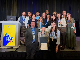 A group of students representing the Augusta University American Chemical Society Student Chapter accepts an award at the 2025 ACS Conference in San Diego, CA.