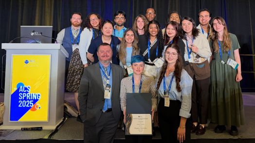 A group of students representing the Augusta University American Chemical Society Student Chapter accepts an award at the 2025 ACS Conference in San Diego, CA.