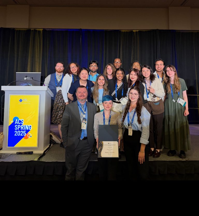 A group of students representing the Augusta University American Chemical Society Student Chapter accepts an award at the 2025 ACS Conference in San Diego, CA.
