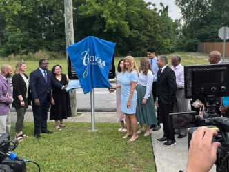 Crowd gathered around for a marker unveiling