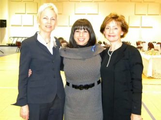 Three women smiling