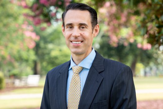 Jeffrey Keenan, the newly named assistant vice president for Student Affairs Facilities for the Division of Enrollment and Student Affairs, standing outside.