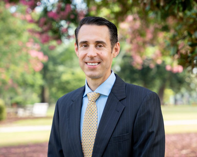 Jeffrey Keenan, the newly named assistant vice president for Student Affairs Facilities for the Division of Enrollment and Student Affairs, standing outside.