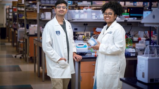 Two students in science lab