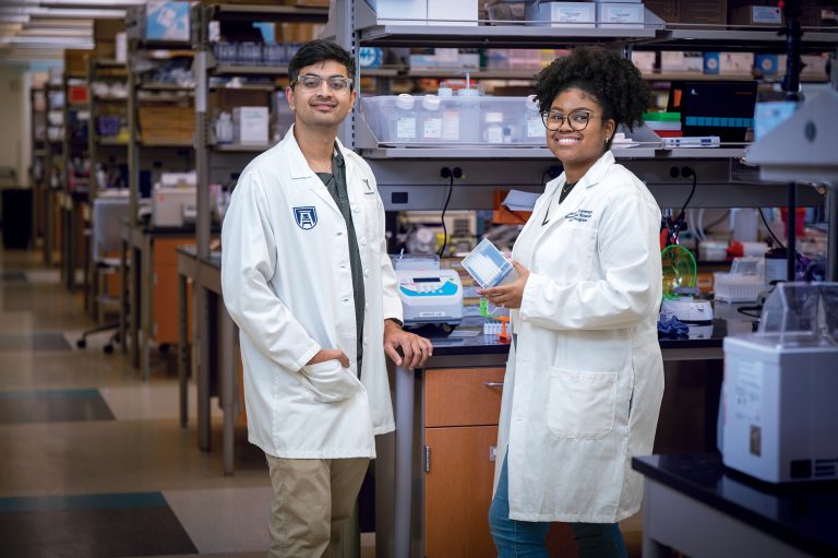 Two students in science lab